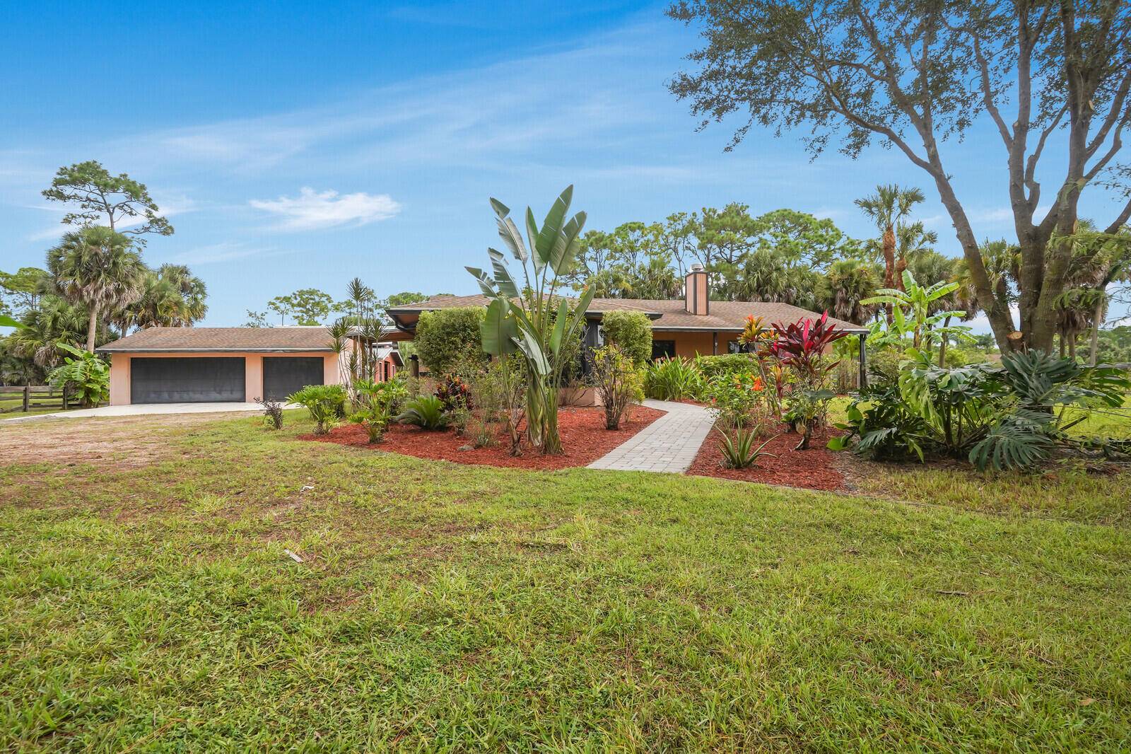 Welcome to your dream home in the heart of Loxahatchee !