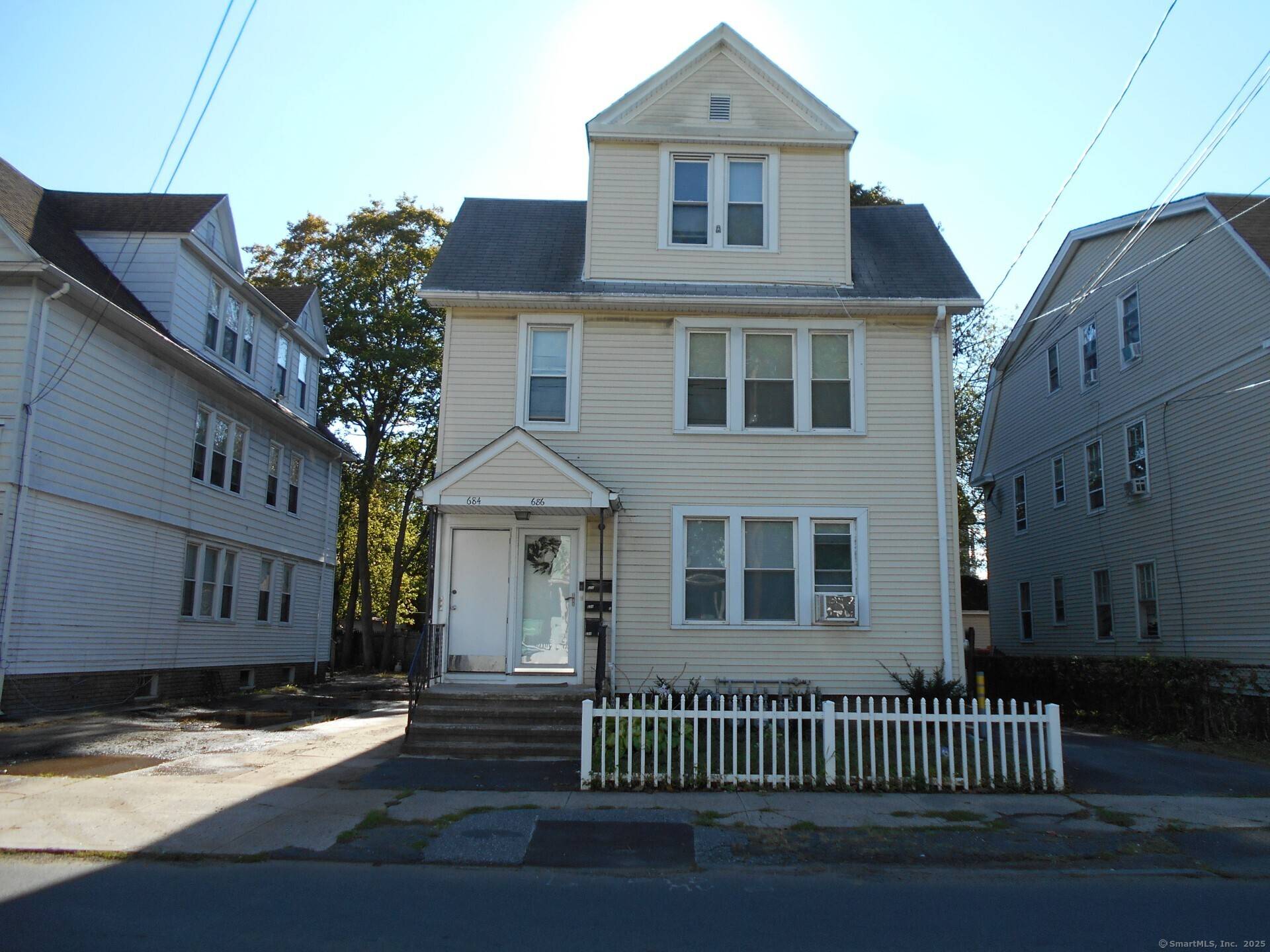 Fully rented well maintained 3 family property.
