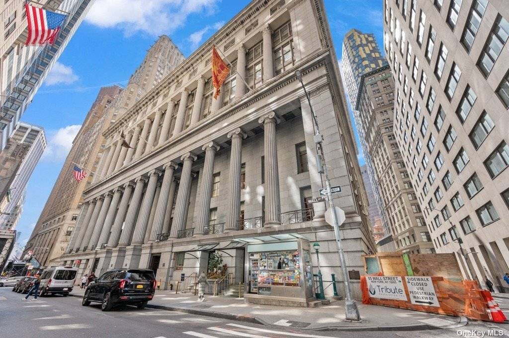 Welcome to 55 Wall Street, a stunning 1 bedroom, 1 bathroom apartment offering 948 square feet of luxurious living space in the heart of Manhattan's iconic Financial District.