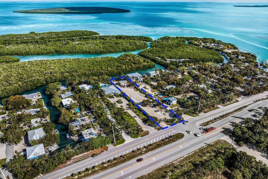 Estate Opportunity Spanning 34, 409 SF, this exceptional parcel offers a scale uncommon in Islamorada, providing the foundation for a spectacular Florida Keys residential estate.