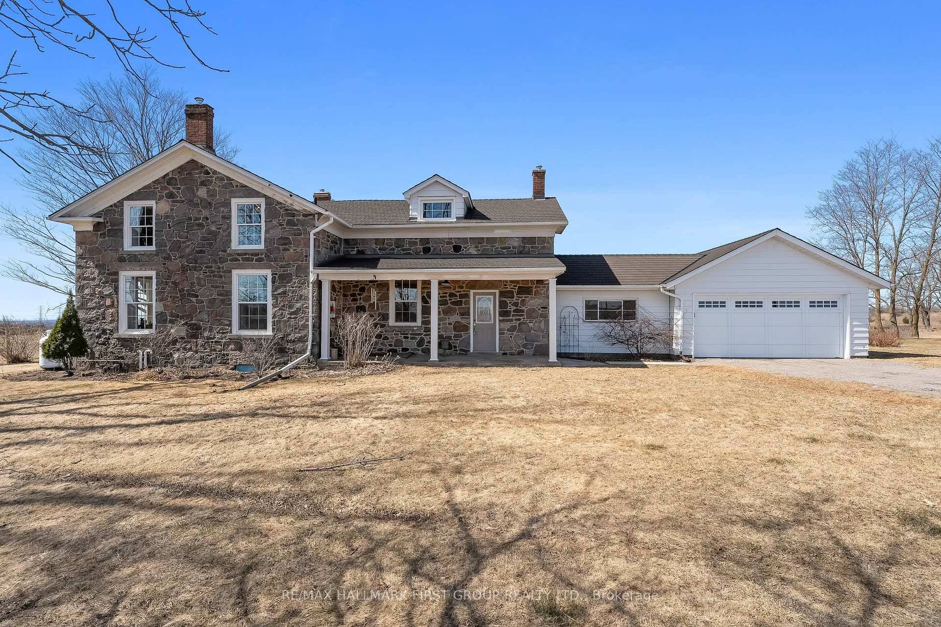 Exceptionally rare 1857 historic stone home on 80 picturesque acres.