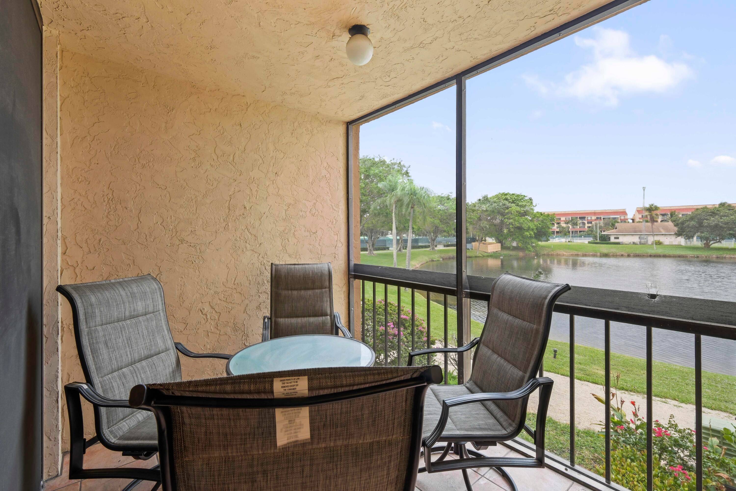 Prime location in Delray Beach for this 2 bedroom, 2 bathroom condo with a serene lake view, situated in the highly sought after Building 6 of the Delray Racquet Club.