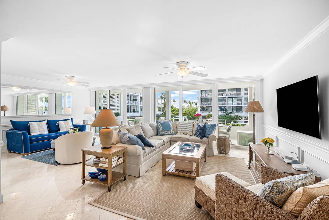 Experience a rarely available lifestyle in this stunning 2 bedroom plus den office, 3 bath corner residence at The Cove, one of Palm Beach's most coveted boutique Intracoastal buildings.