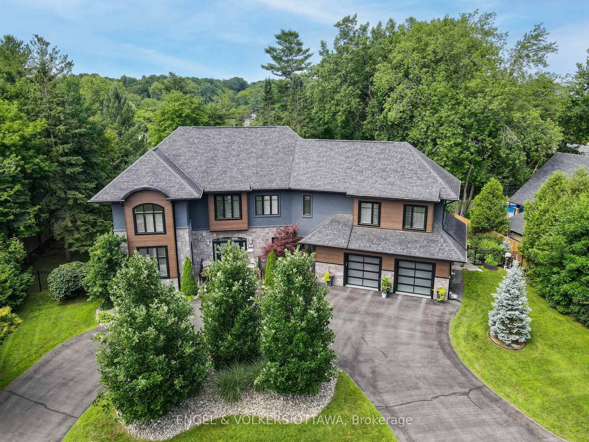 This handsome 5 bedroom custom home constructed with ICF to the roof line for superior strength and energy efficiency offers soaring 10 ft ceilings, abundant natural light from oversized windows ...