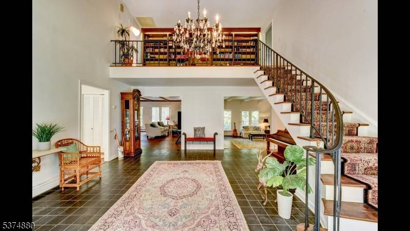 Presenting 89 N Pocono Rd, Denville a distinguished custom built residence offering 3 bedrooms, 2.