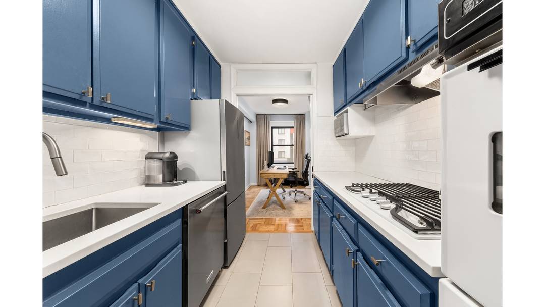 Welcome to 301 East 48th Street, Unit 2G, an oversized convertible two bedroom co op in the heart of Midtown East.