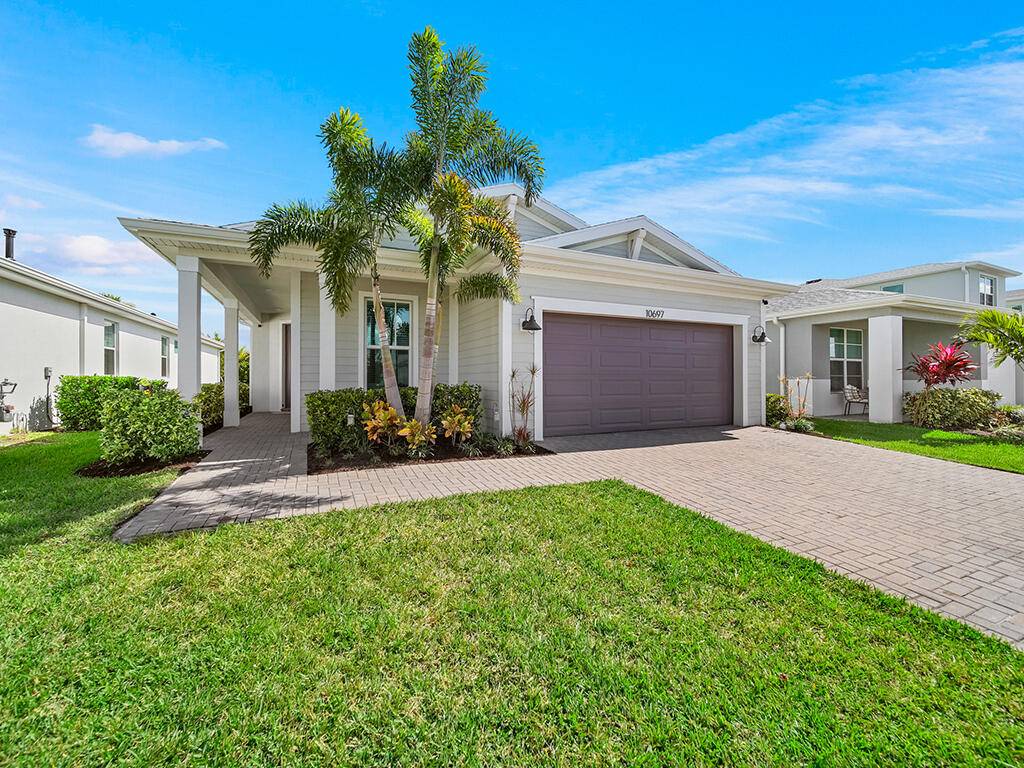 Welcome to this stunning 3 bed, 2 bath, 2 car garage home, built in 2022, featuring durable CBS construction impact windows doors for added safety peace of mind.