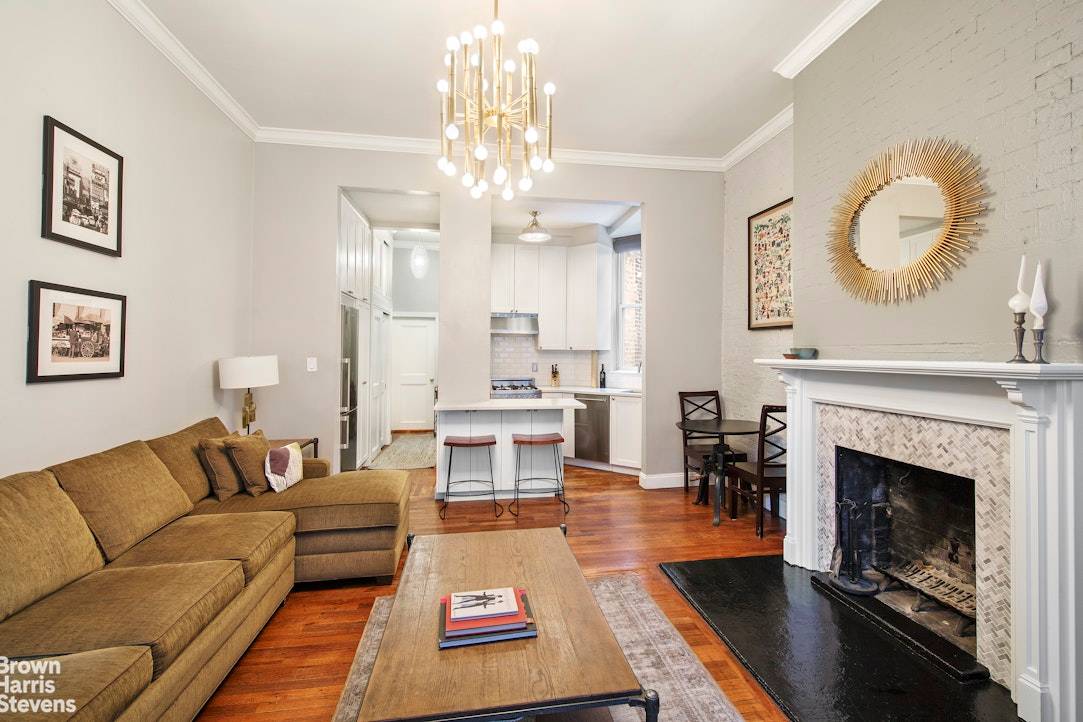 ONE BEDROOM WITH SOARING CEILINGS Fabulous pre war one bedroom with soaring 11' ceilings, renovated kitchen, exposed brick, and yes, a working wood burning fireplace !