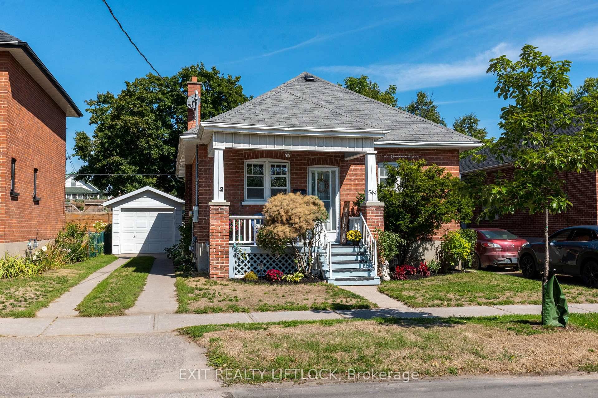 This lovingly maintained 2 bedroom brick bungalow is the perfect blend of comfort, convenience, and character.