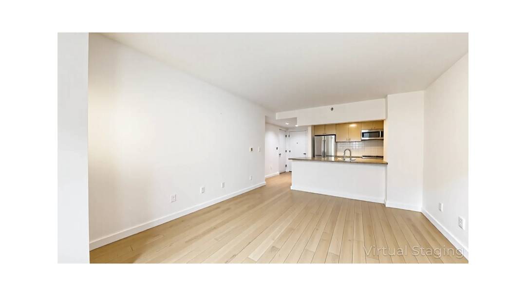 Spacious and bright, this two bedroom, two bathroom residence offers a modern layout with fantastic natural light through west facing windows overlooking Adam Clayton Powell Jr.