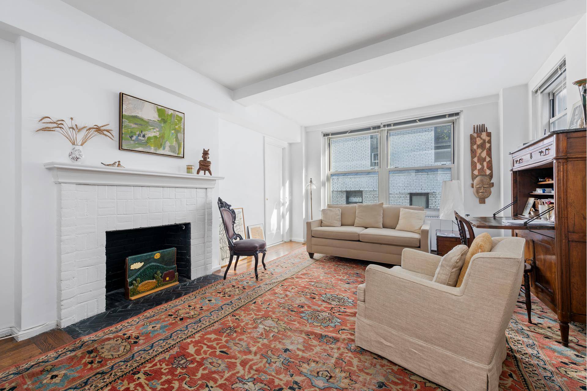 The largest of the Eastgate Studios, this prewar home boasts a large living area with wood burning fireplace and an eat in kitchen on a lovely tree lined block just ...