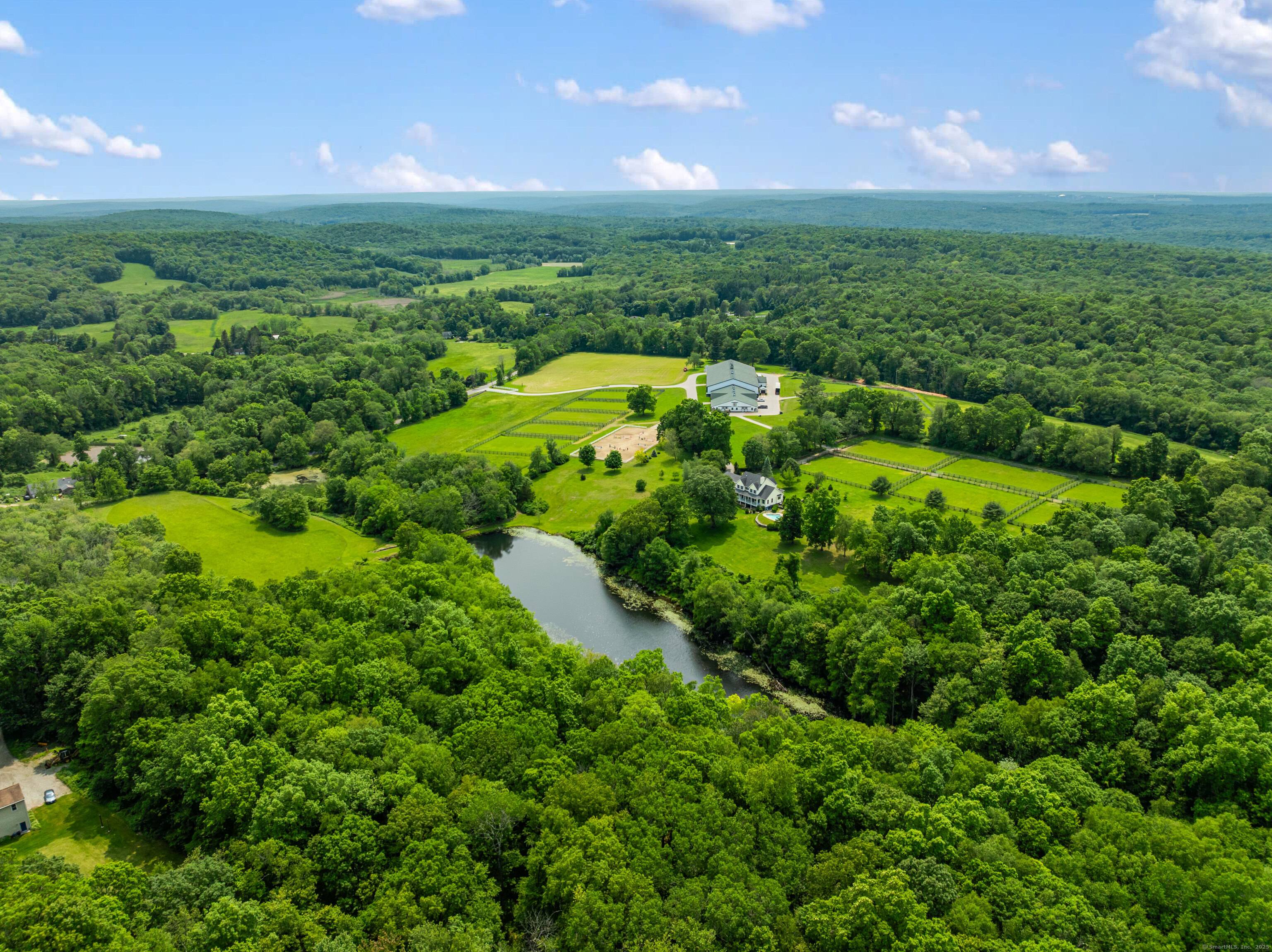 PROMINENT 55 ACRE EQUESTRIAN FACILITY w PRIMARY 6, 000SF RESIDENCE w 2 APARTMENTS !