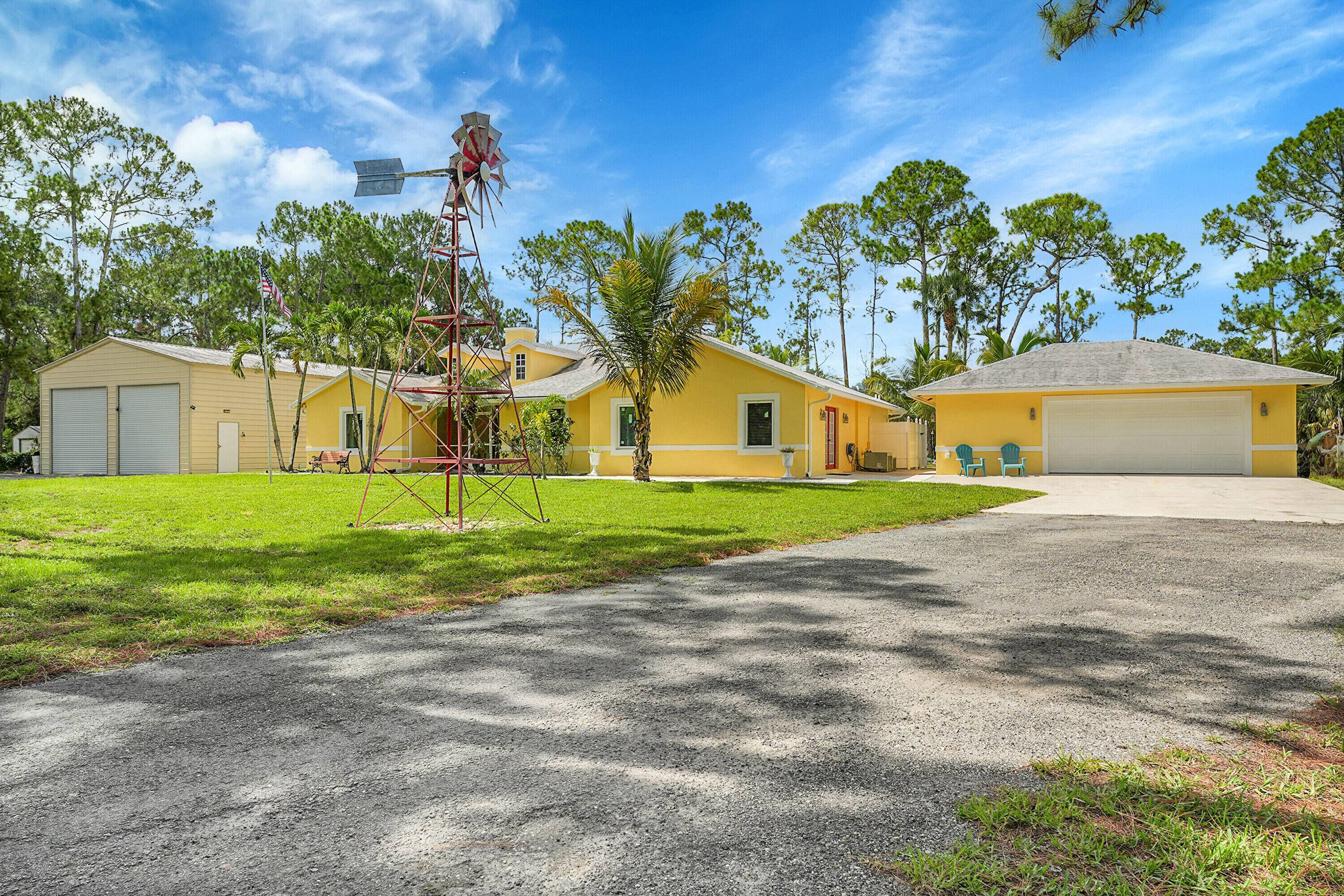 Welcome to this beautiful NON HOA 4 bedroom, 2 bathroom home that includes a bonus room office 2 detached buildings.