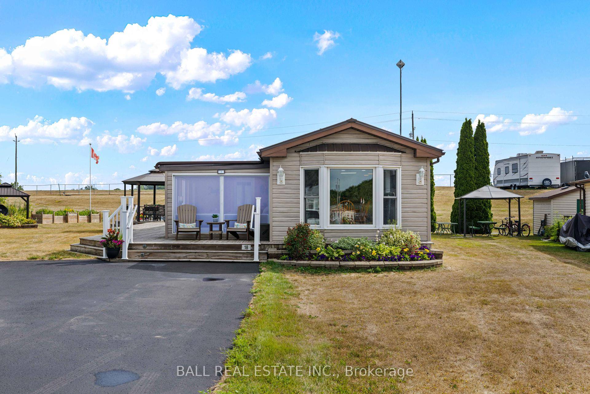 Discover 18 Edwin Court a bright and spacious 2 bedroom, 2 bath bungalow in the sought after Shady Acres Resort.
