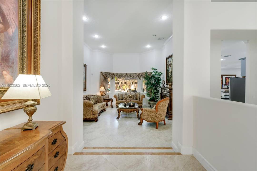 Beautiful home situated on a spacious 16, 025 s f lot featuring a circular driveway, porte cochere, and a 2 car garage.