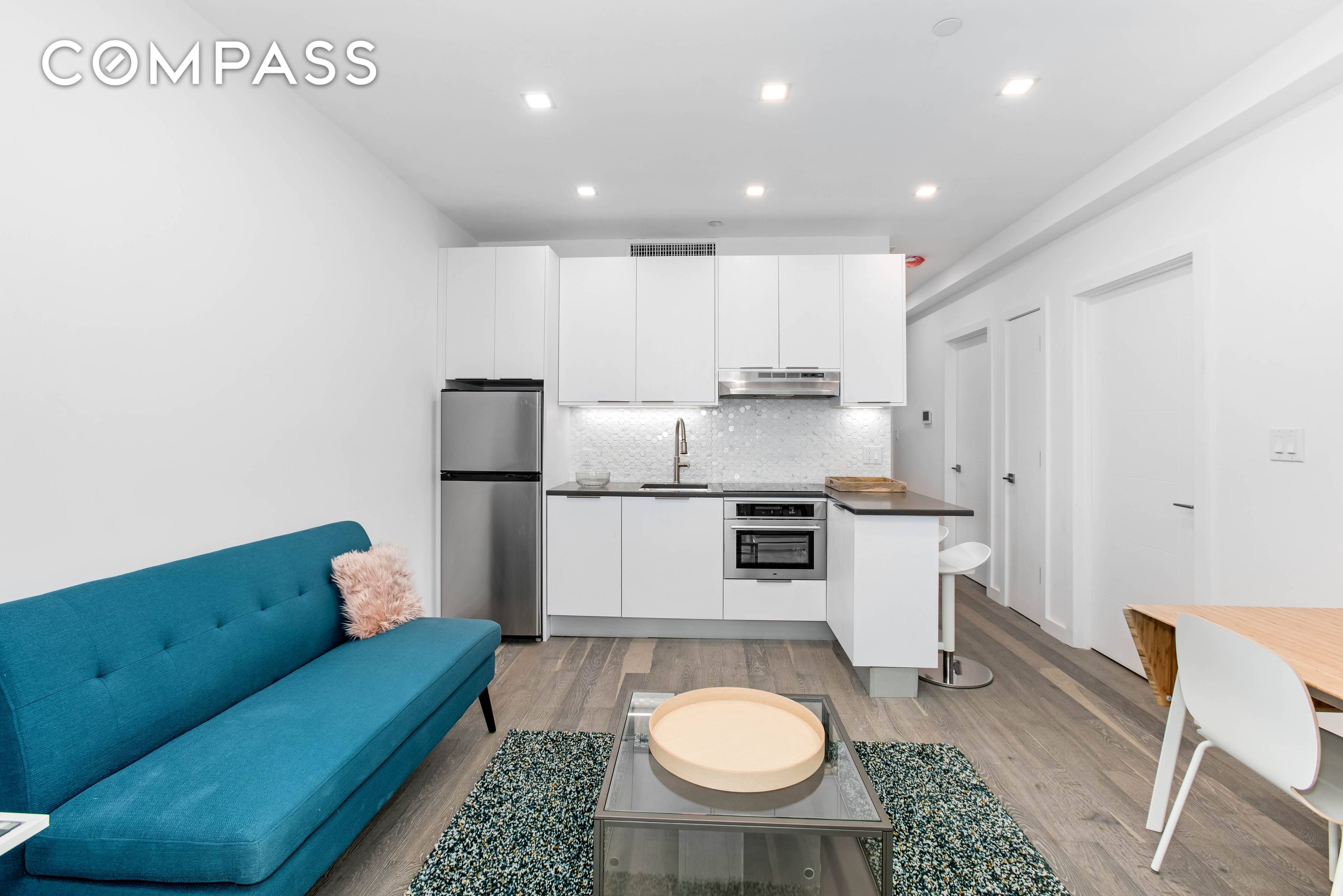 Williamsburg Elevator Building Newly Renovated 2BD 1BA Home with Private Balcony, Central Air, Hardwood Flooring, Loft like Ceilings, Sound Proof Windows, Chef s Kitchen with Integrated Appliances, Video Intercom, and ...