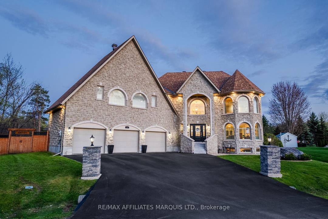 A stunning indoor heated salt water pool with hot tub and sauna, unbelievable curb appeal, a three car garage, a generac system, a fenced rear yard, and a fully updated ...