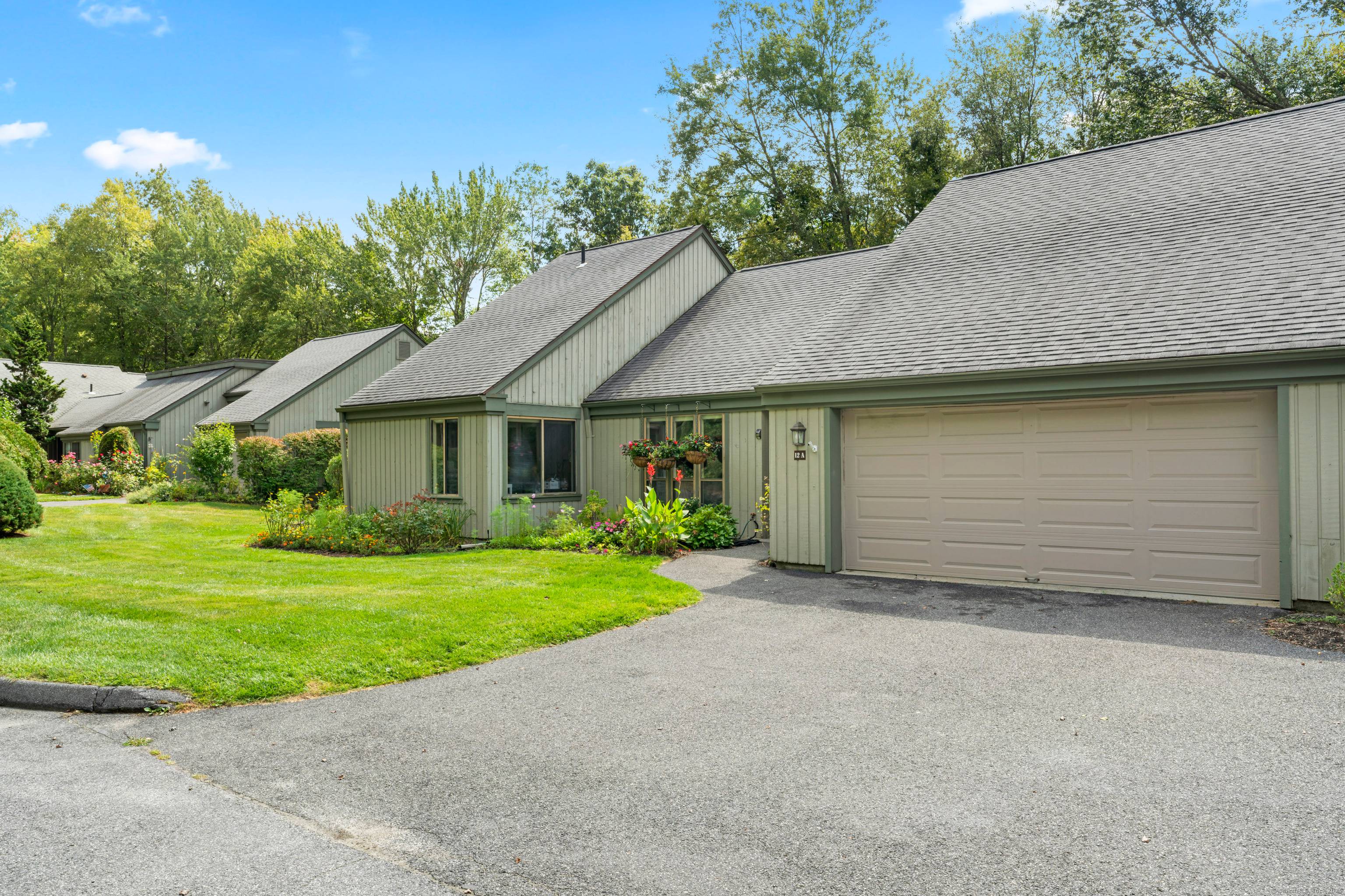 Welcome to 12 Heritage Crest, a beautifully updated home offering true one level living in a private, serene setting.