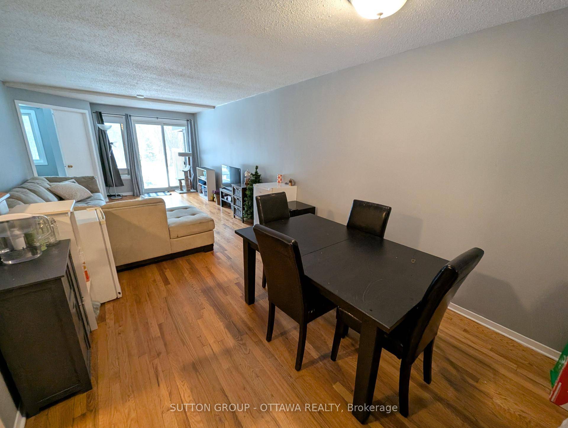 Spring into this ! Three bedroom main floor condominium in Sandy Hill near the Lees LRT station that has a walkout yard backing onto nature and a short walk to ...