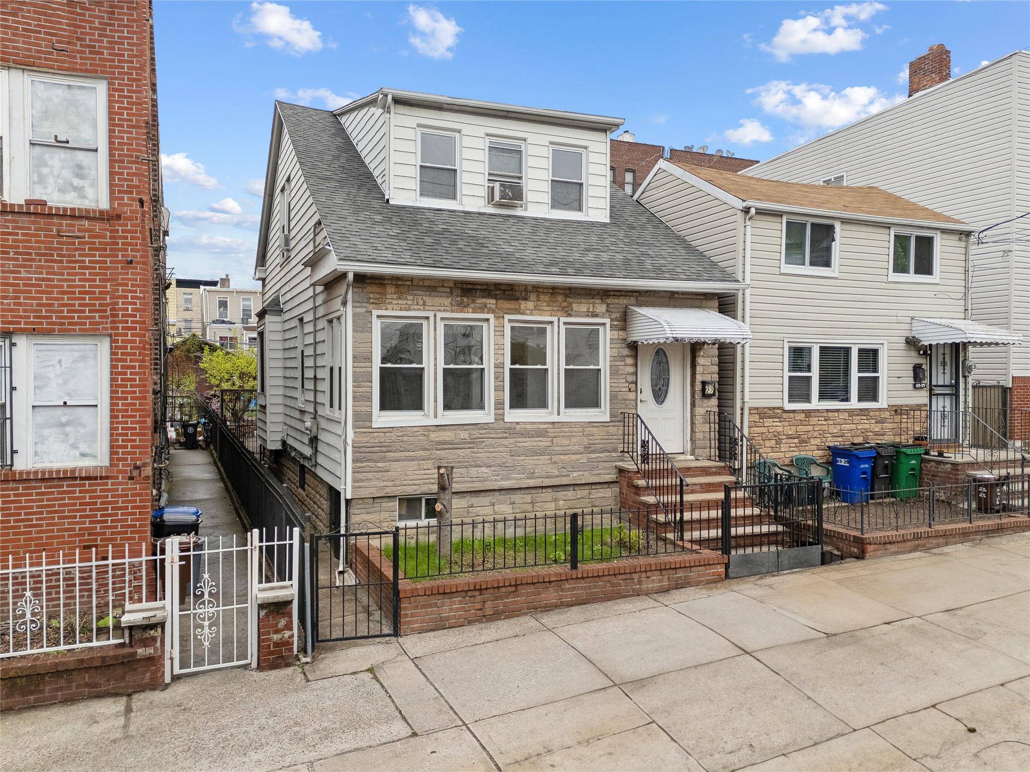 This single family home has incredible potential with R5 zoning.