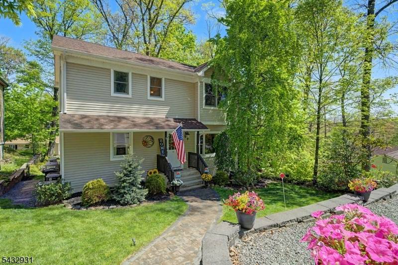 Beautiful large custom home offering year round lake views and versatile living space throughout.