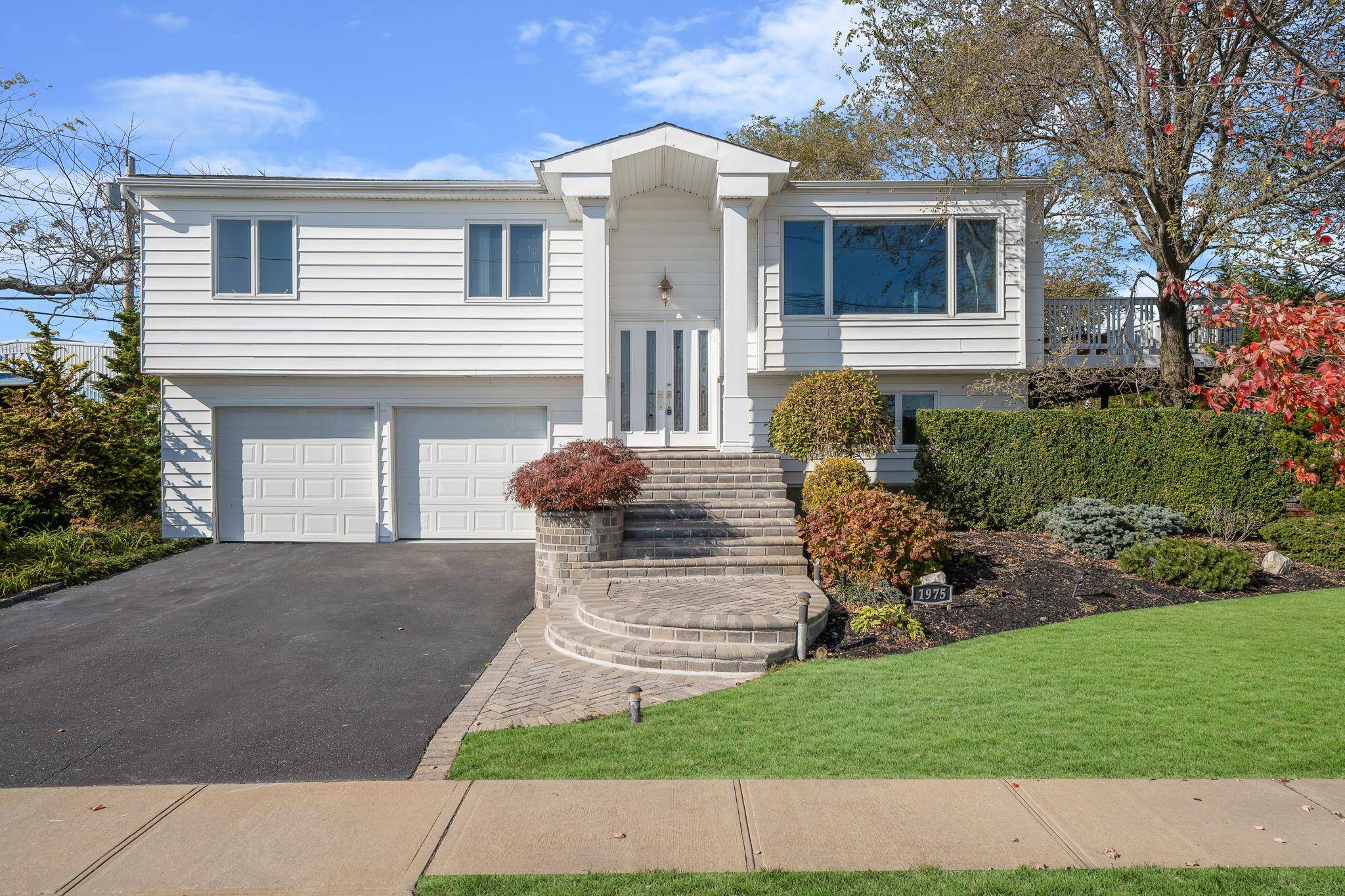 Newly Renovated amp ; Updated South Merrick 4 Bedroom, 3 Full Bath Hi Ranch Situated On A Oversized Corner Lot !