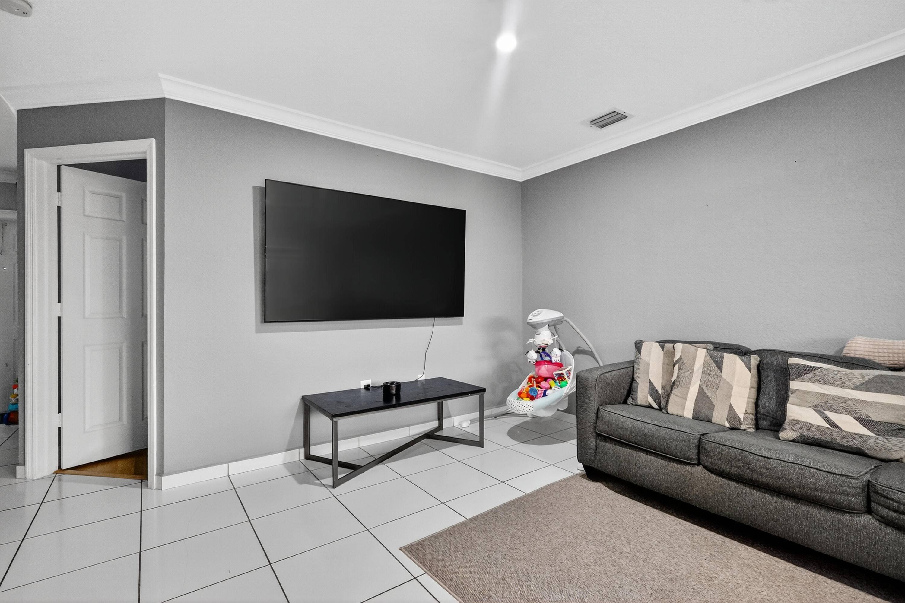 Welcome to this beautifully maintained 3 bed, 2 bath townhome located in the heart of Hialeah Gardens.
