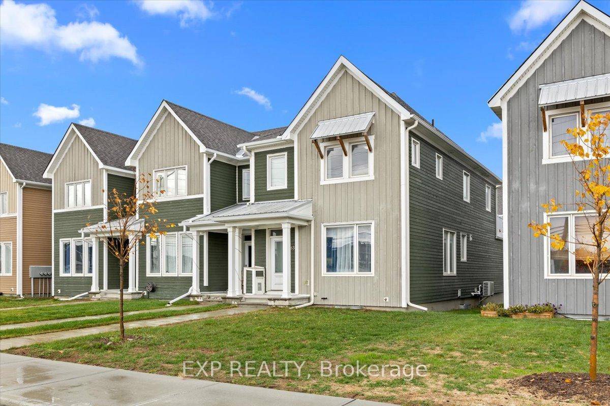 Welcome to 6347 Perth Street a 2021 built end unit townhome in the charming village of Richmond.