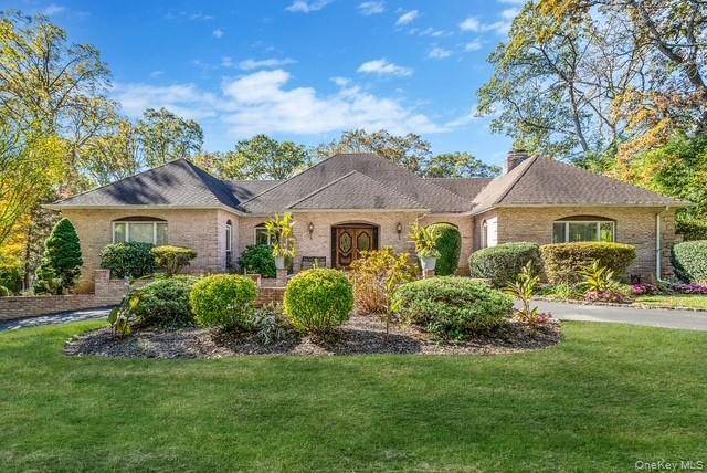 Experience refined living in this stunning 5 bedroom, 5 bath expanded ranch, perfectly situated in one of Dix Hills most sought after neighborhoods.