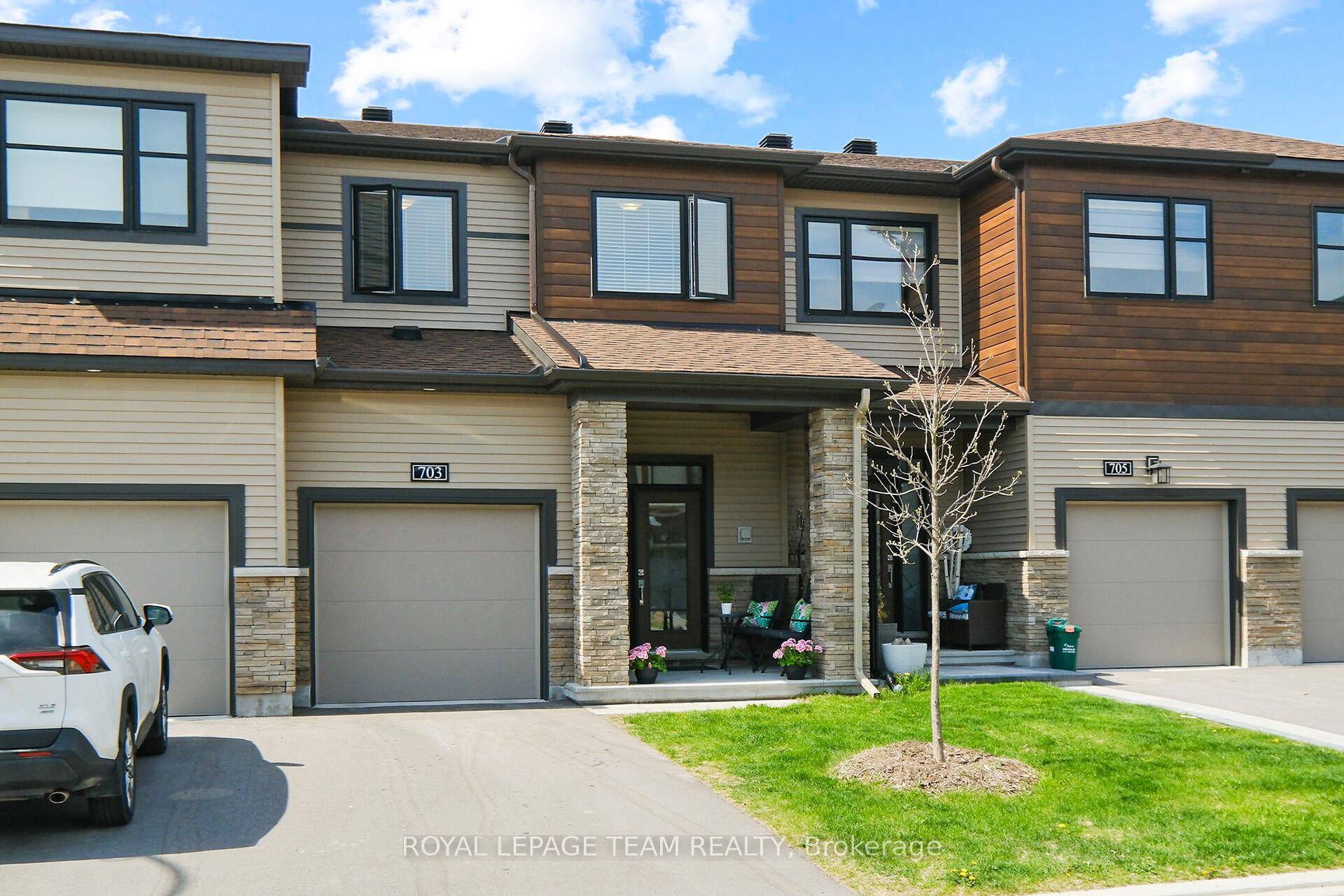 Step into modern living with this beautifully upgraded Monterey townhome featuring 3 bedrooms, 4 bathrooms, and a fully finished basement perfect for today's lifestyle !