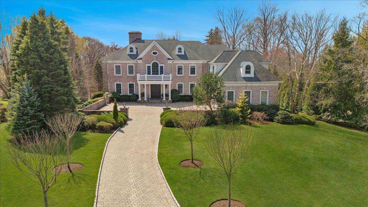 Impressive Center Hall Colonial set on a private cul de sac.