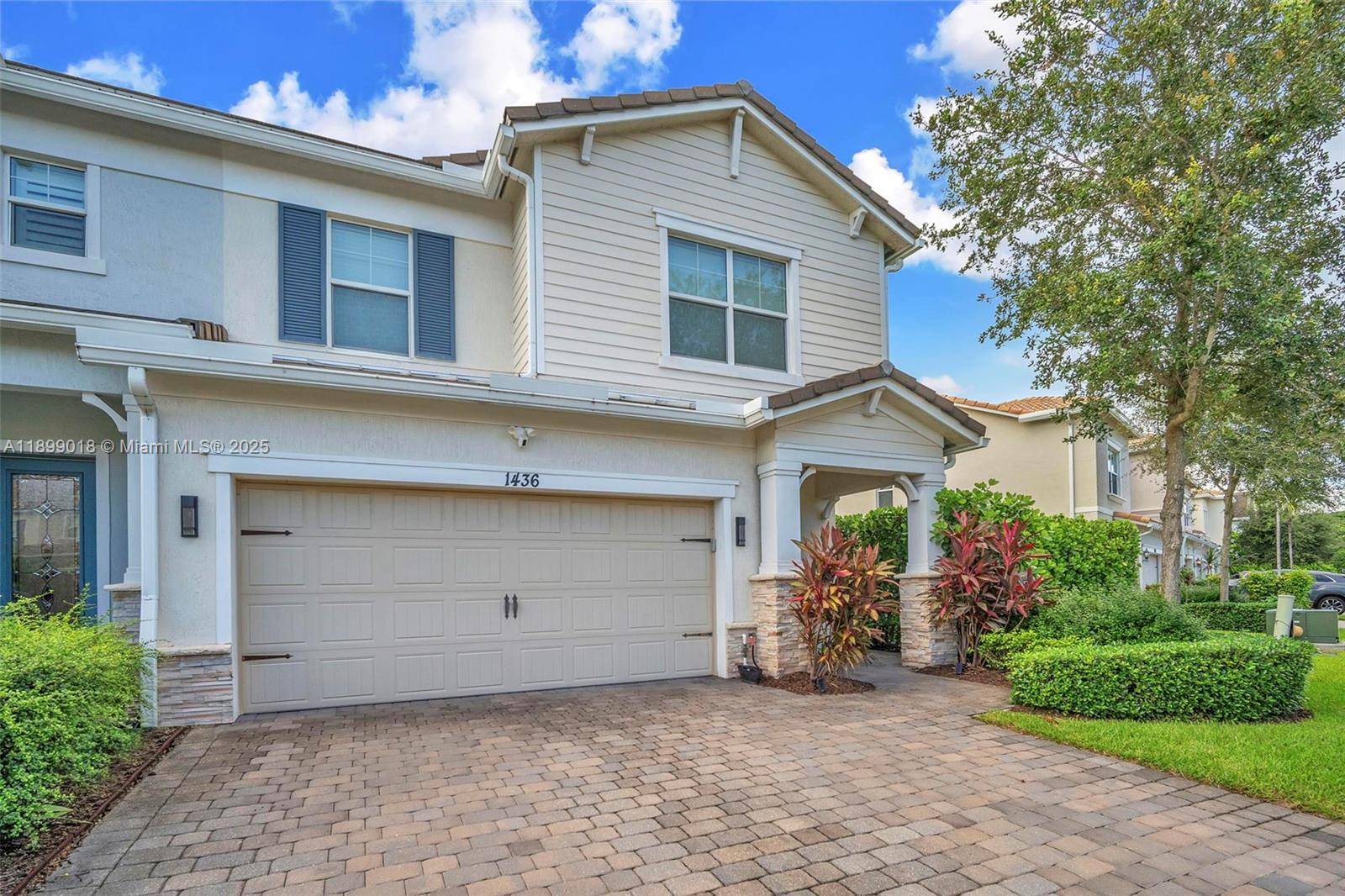 Rarely available corner lot townhome !