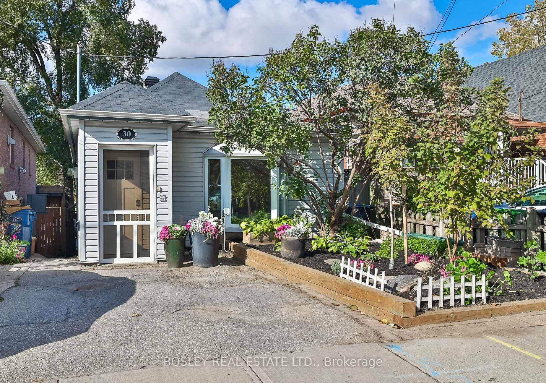 Set against a serene backdrop of mature trees and rolling terrain, this bright and spacious backsplit bungalow hybrid offers a rare blend of cottage tranquility and urban convenience.