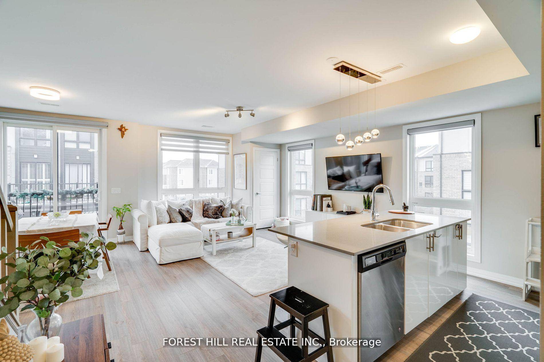 Absolutely stunning upper level two bedroom, three bathroom stacked townhome in the sought after Dempsey neighborhood.
