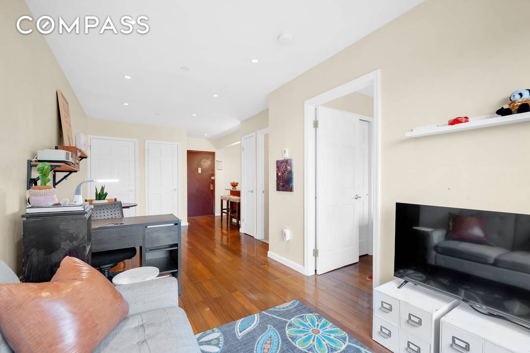 Top Floor 1BR Penthouse Condo with Balcony, Open Views amp ; In Unit Laundry in the Heart of Sunnyside Welcome to your private perch in the sky a sun drenched ...