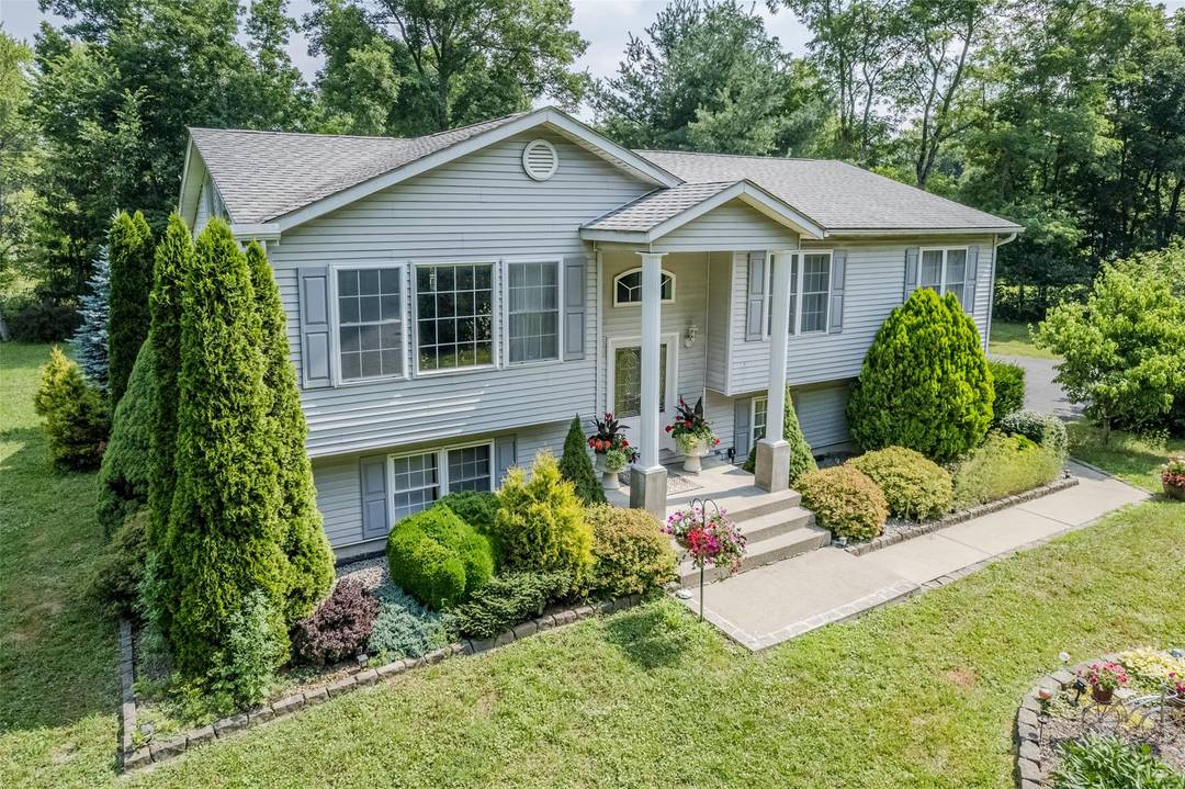 Welcome to 300 Mountain Lodge Road a beautifully updated and move in ready bilevel home offering the perfect blend of modern comfort and functional space.