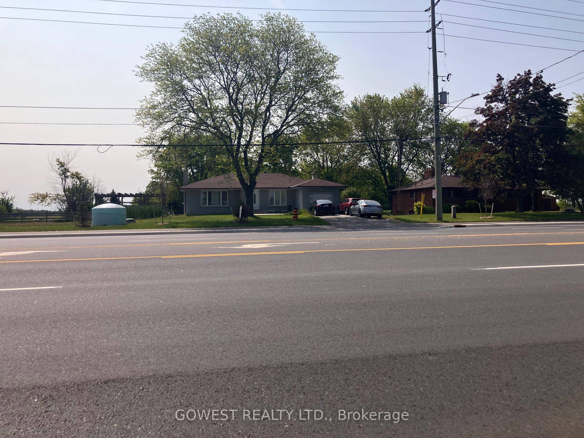 Clean 3 1 Bedroom, 2 full bathroom bungalow set on about a half acre of land with fully fenced in rear yard for children or pets.