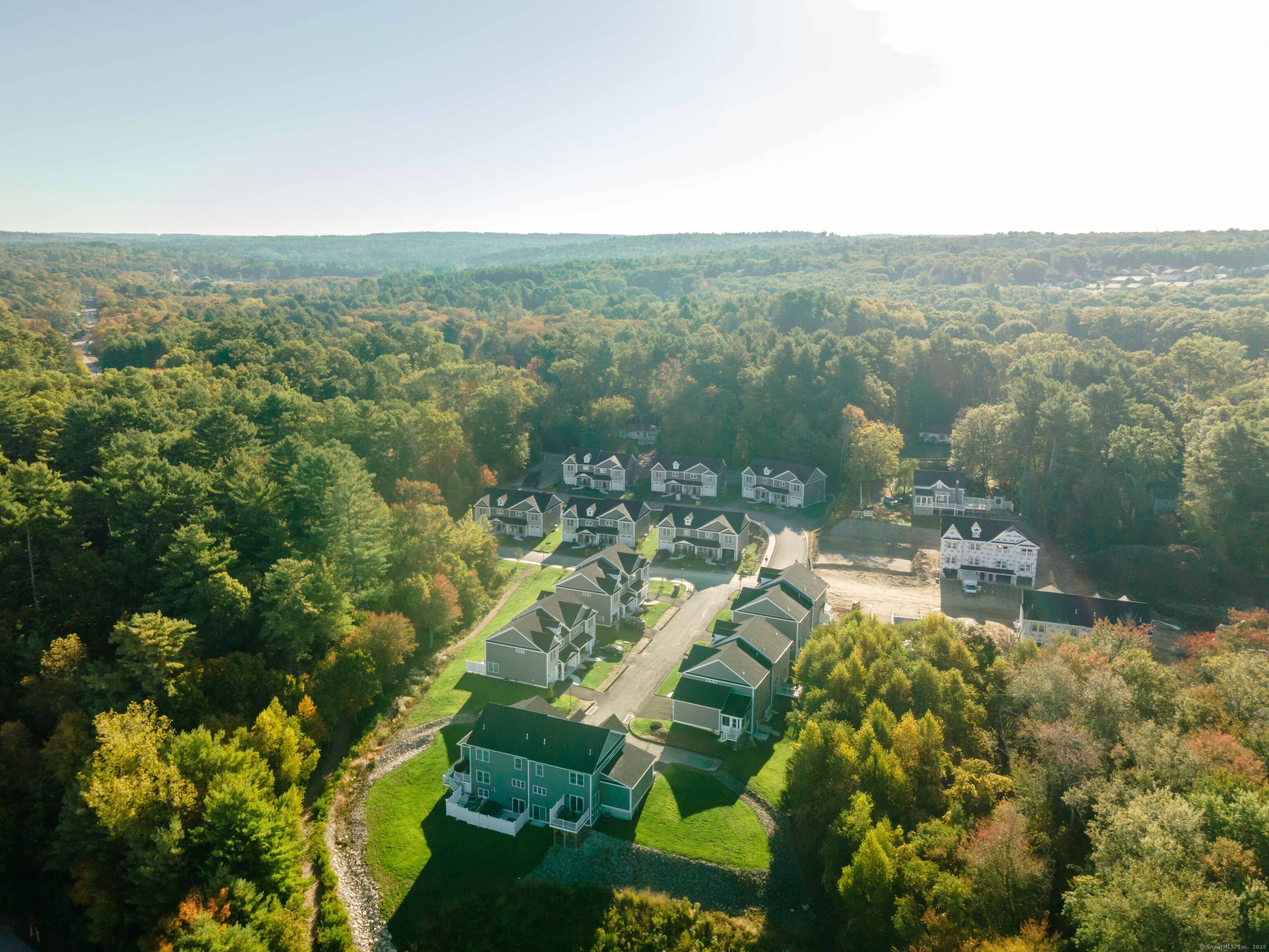 BEAUTIFUL CUSTOM BUILT CONDOMINIUMS IN A SCENIC AREA OF DAYVILLE !