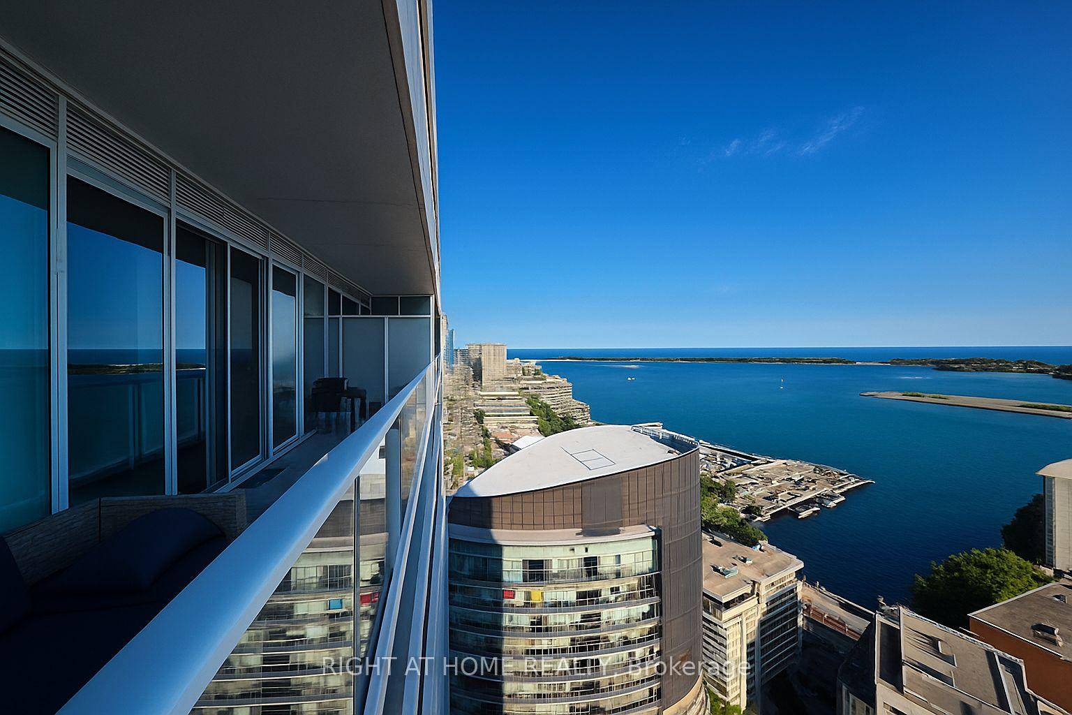 High above the city, where the horizon is painted daily by the shimmer of Lake Ontario, you'll find this rare residence a 2 bedroom plus den or flexible 3rd bedroom ...