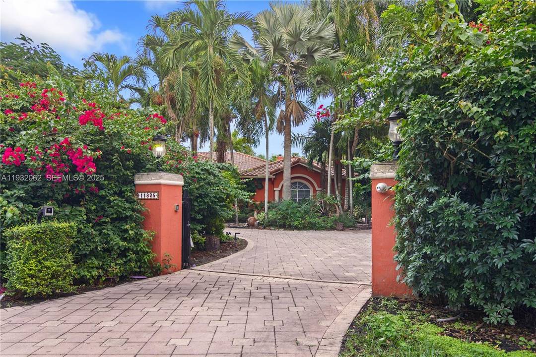 ELEGANT MEDITERRANEAN RESIDENCE ON A QUIET STREET IN THE HEART OF PINECREST.