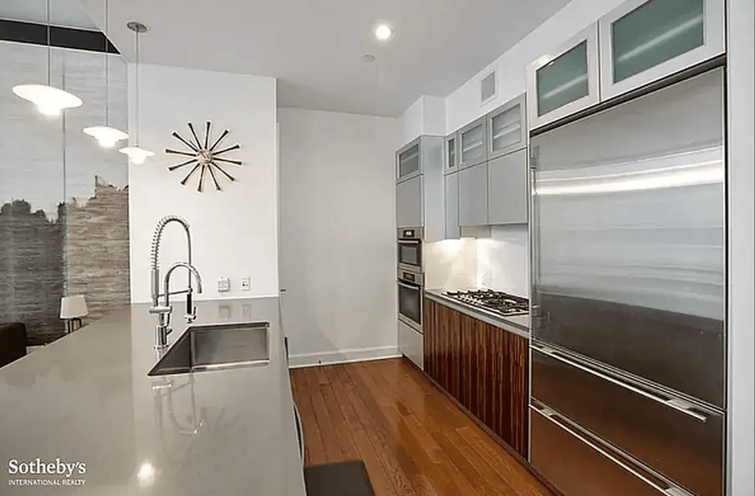 Gracious proportions and elegant design define this beautiful residence, featuring soaring 11'4 ceilings, oversized windows, expansive bedrooms, and abundant closet space.