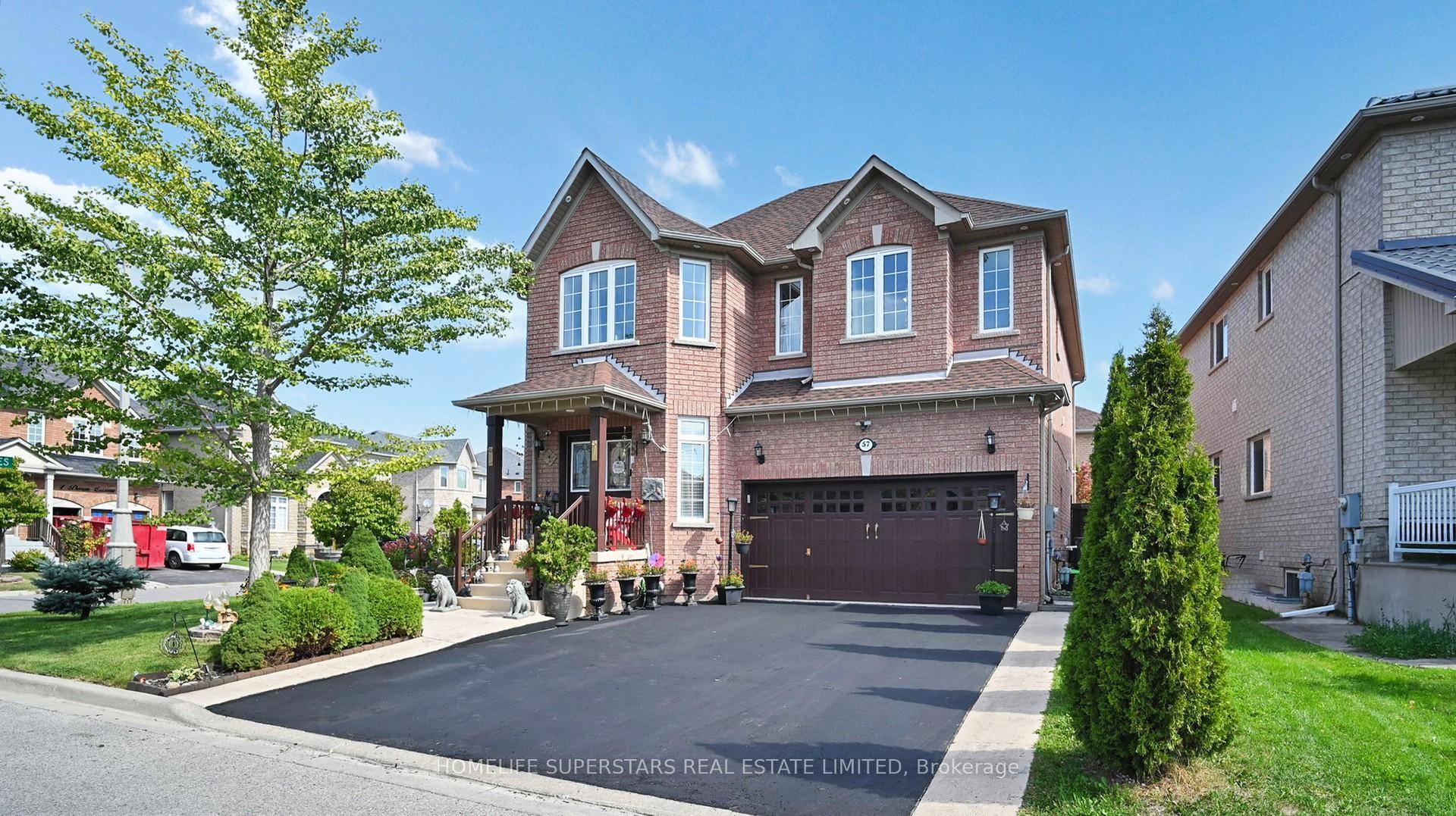 Absolutely Stunning Detached Home with double door entrance and bonus double door entrance to the basement !