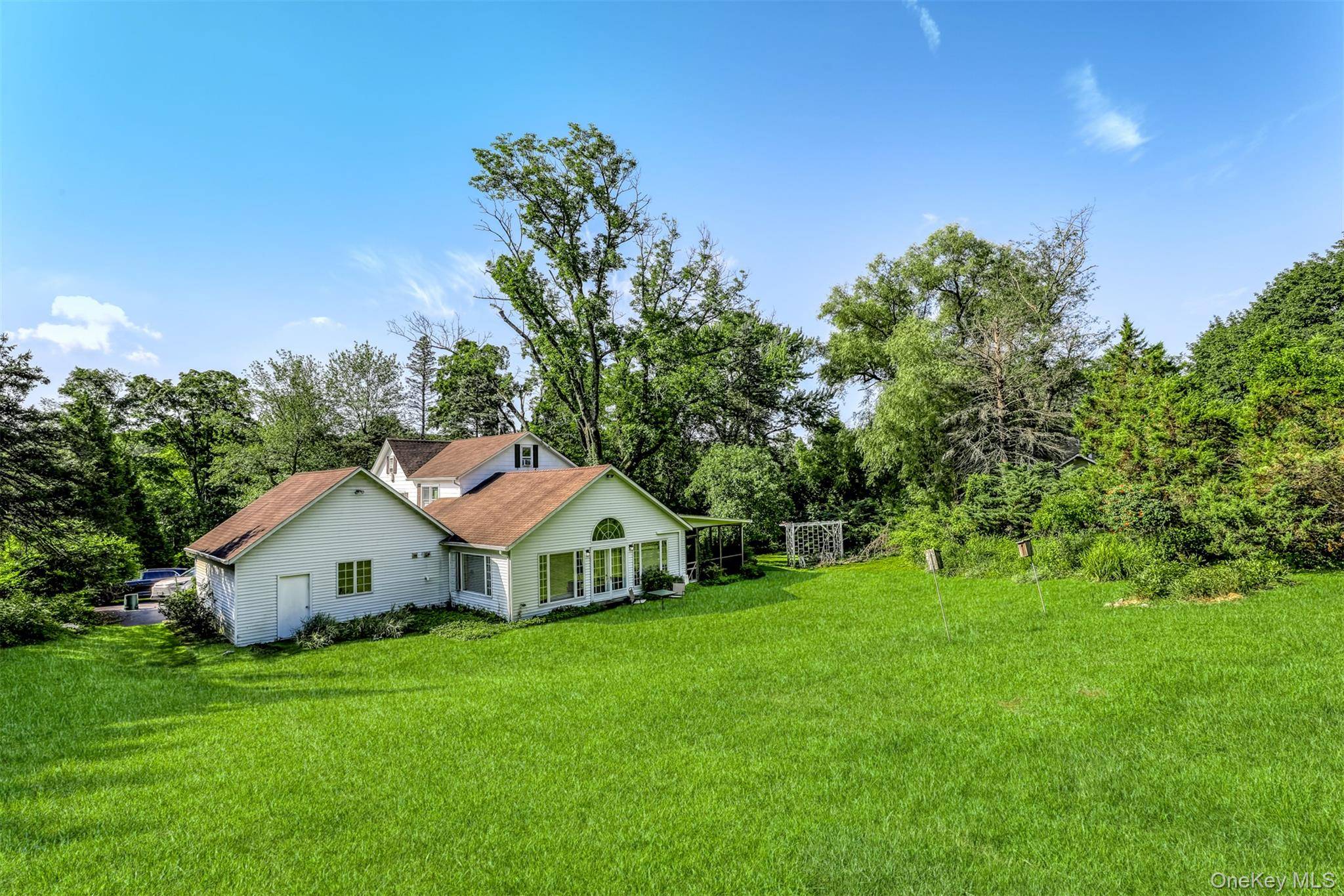 Fall in love with this one of a kind renovated Farmhouse Colonial where timeless charm meets modern updates.