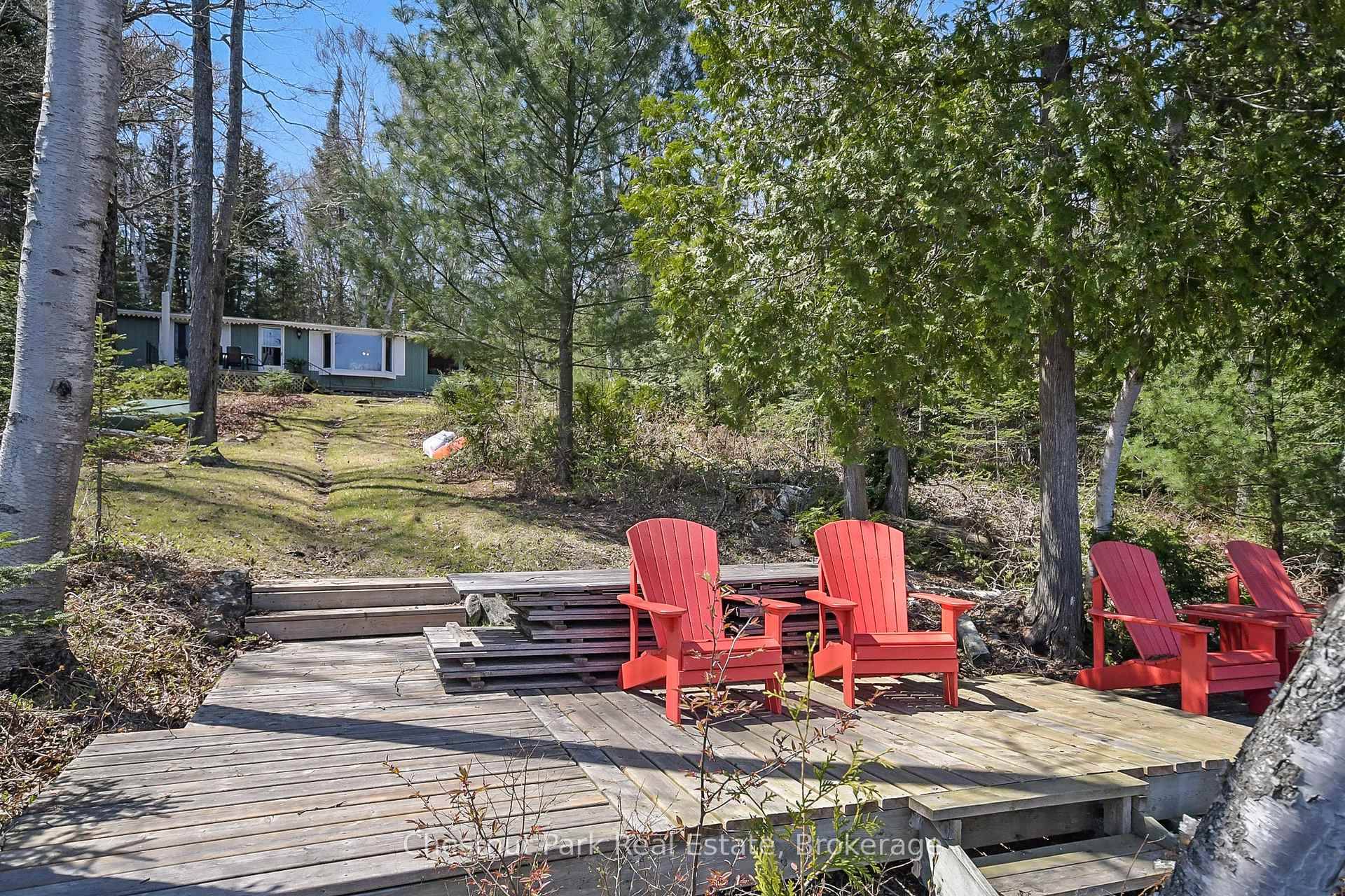 CLAM LAKE, three season cottage on year round paved municipal road.