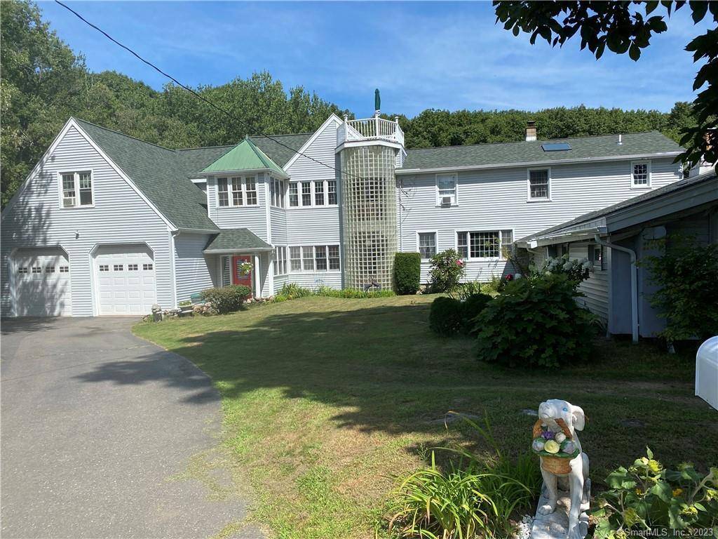 Stunning property consisting of a contemporary 4, 680 SF home with 18 rooms on 36 acres that are sub dividable with 16 building lots in Wolcott, CT.