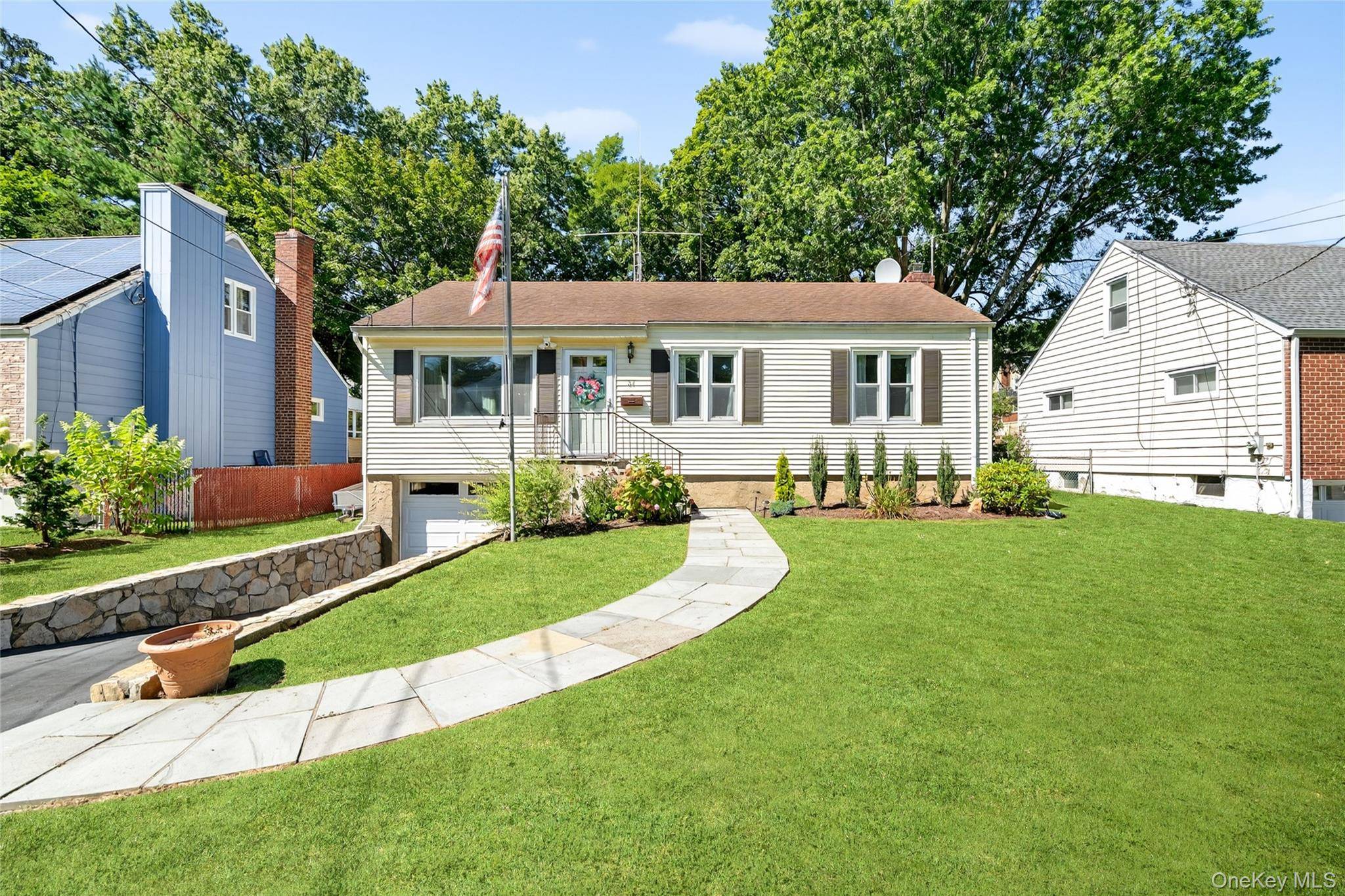 Welcome to this beautifully maintained 3 bedroom, 1 bath ranch style home, perfectly located in the heart of White Plains.