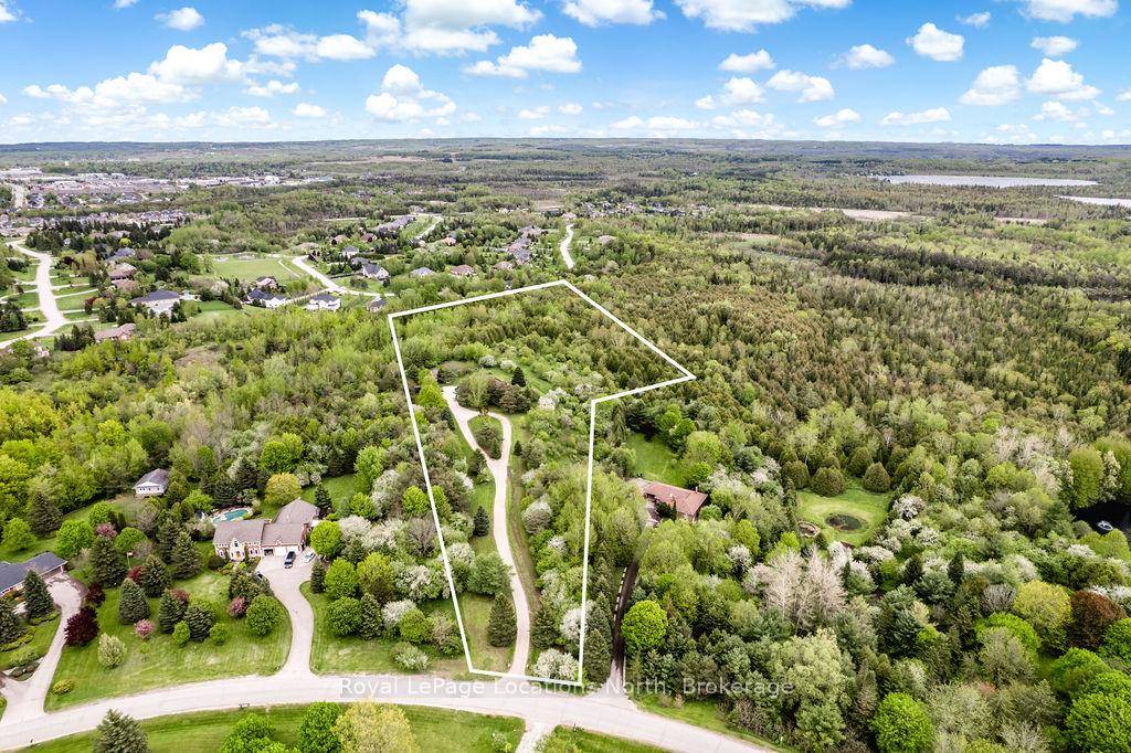 Rare FIND Prestigious Estate Living on Nearly 10 Acres in Garafraxa Woods.