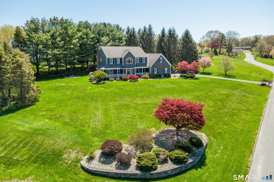 Sip lemonade on your wrap around front porch while enjoying the distant mountain views in this sought after neighborhood.