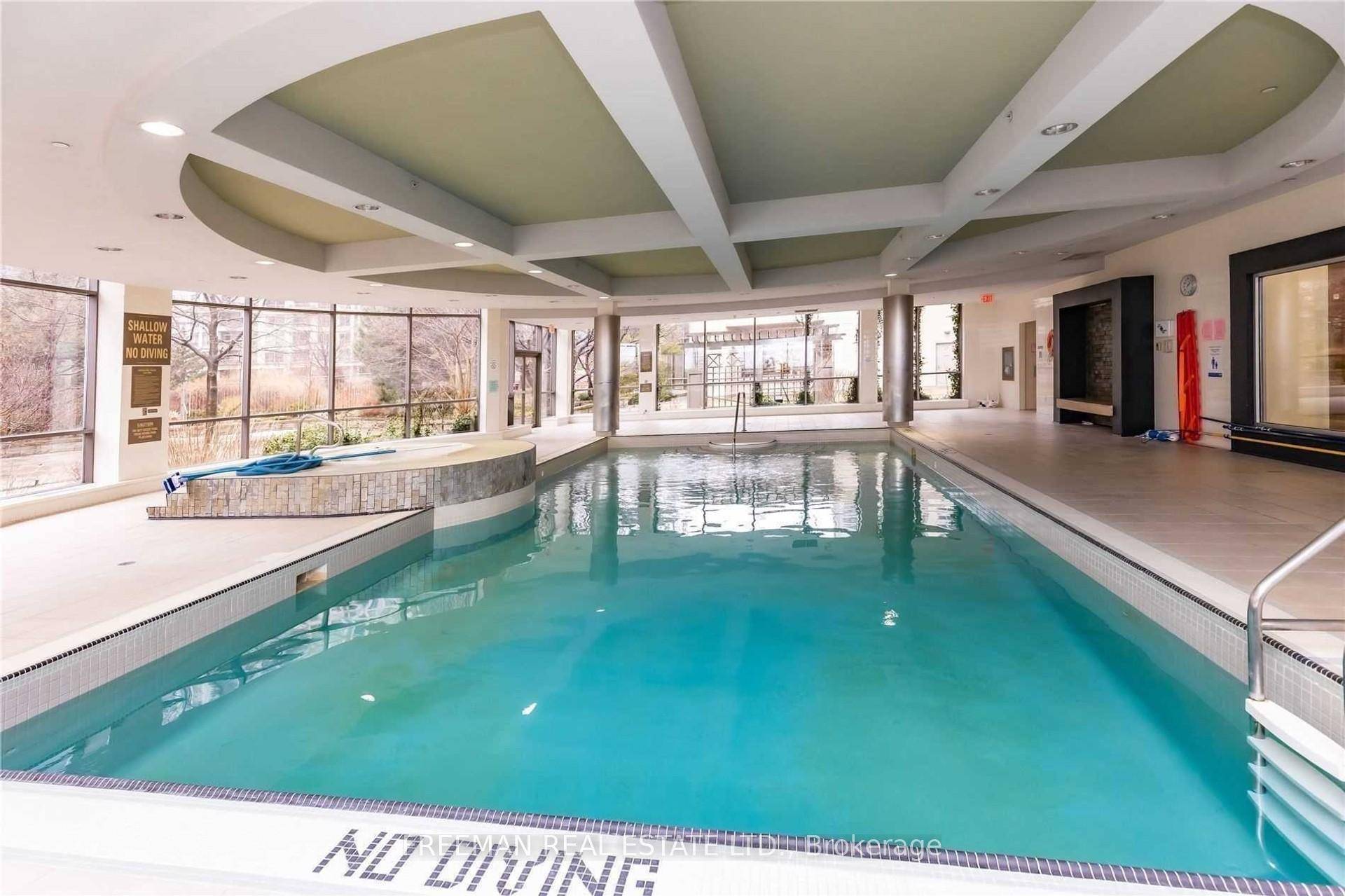 Spacious 2 1 bedroom, 2 bathroom condo with open concept dining and living rooms, a pre wired surround sound system and elegant crown moulding throughout.