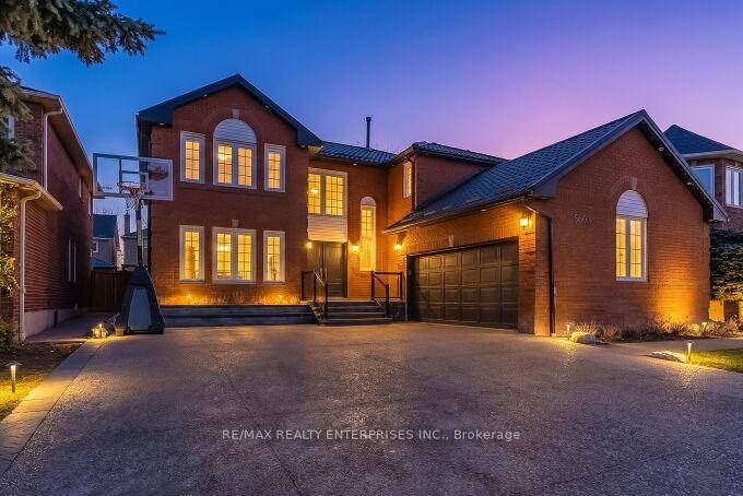 A true show stopper ! This stunning 5 bed, 4 bath offers approximately 5000 sq ft of beautifully finished living spaces and showcases over 400K in high end upgrades throughout.